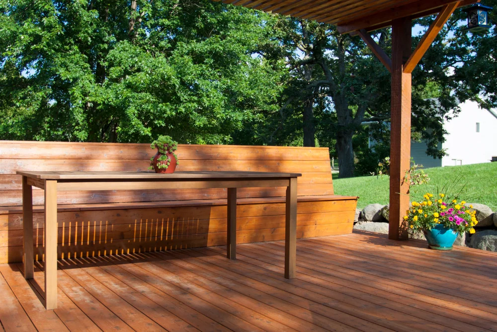 Wood deck with pergola and built-in bench — NC foothills